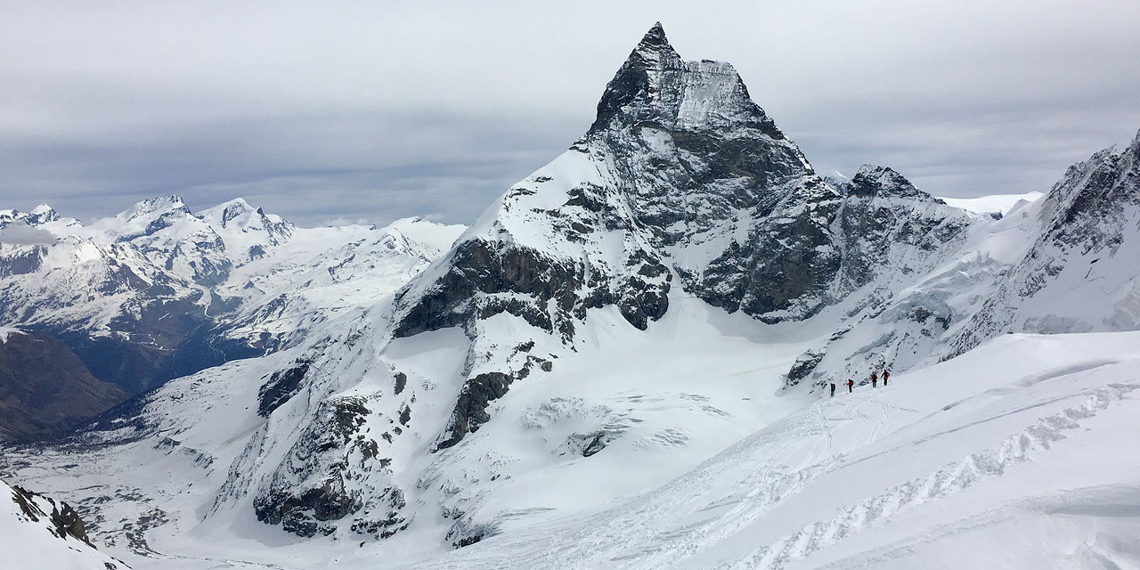 Ski tourers below the Matterhorn at the end of a successful Haute Route
